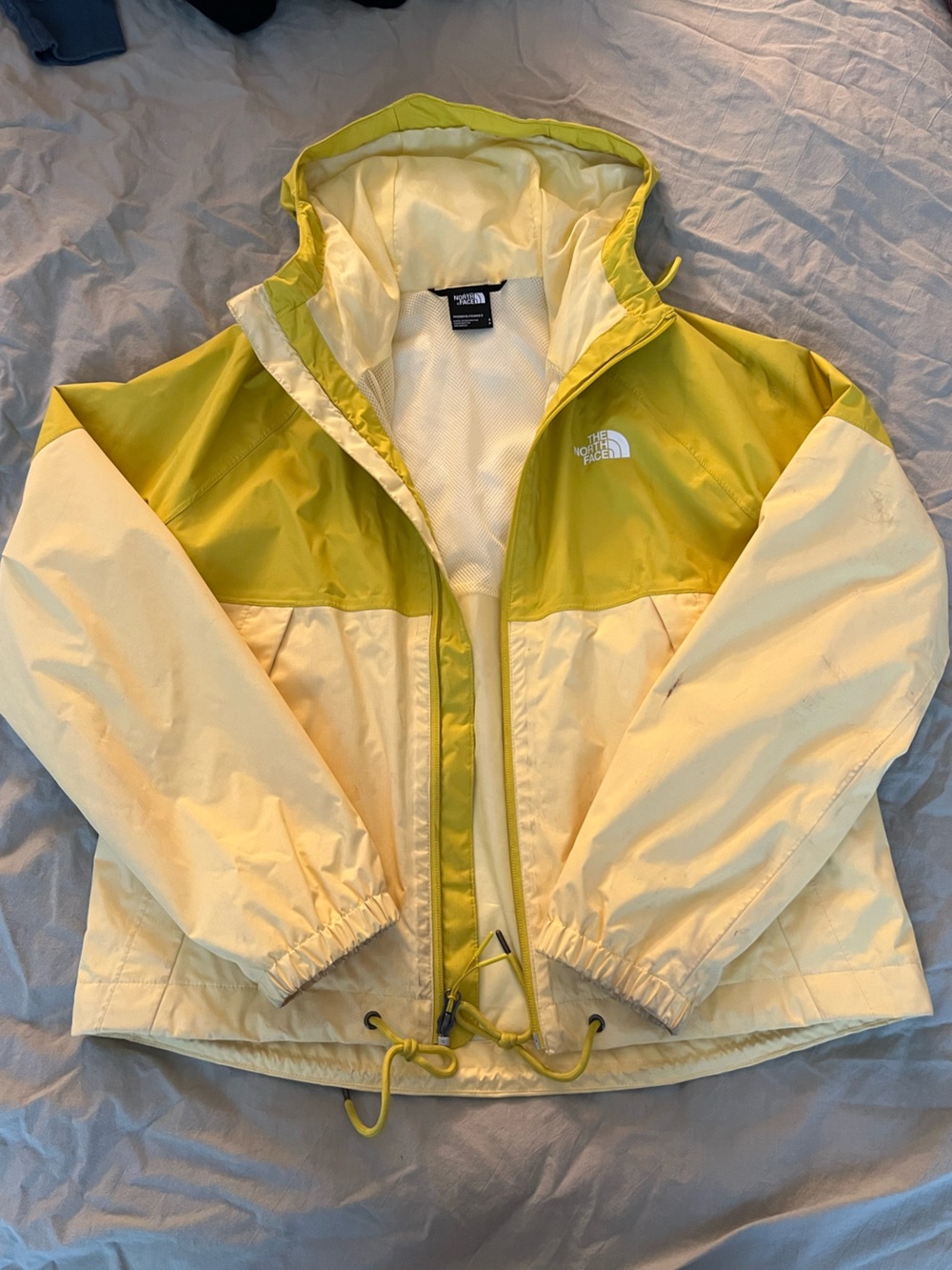 The North Face Pale Yellow Hooded Raincoat Jacket